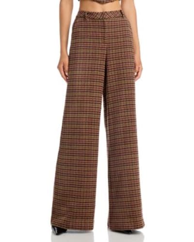 a pair of women's plaid pants to show what a star piece  is for Elements Of Image's Academy Award Styling Method. 